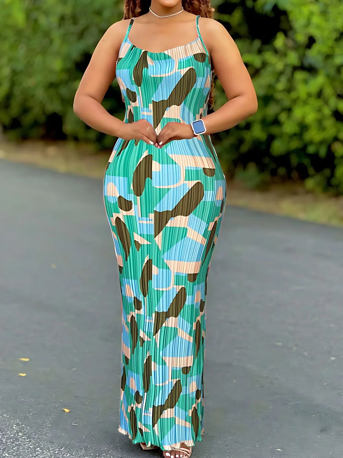 Elegant slim fit beach style dress featuring a vibrant tie dye print, ideal for summer occasions.