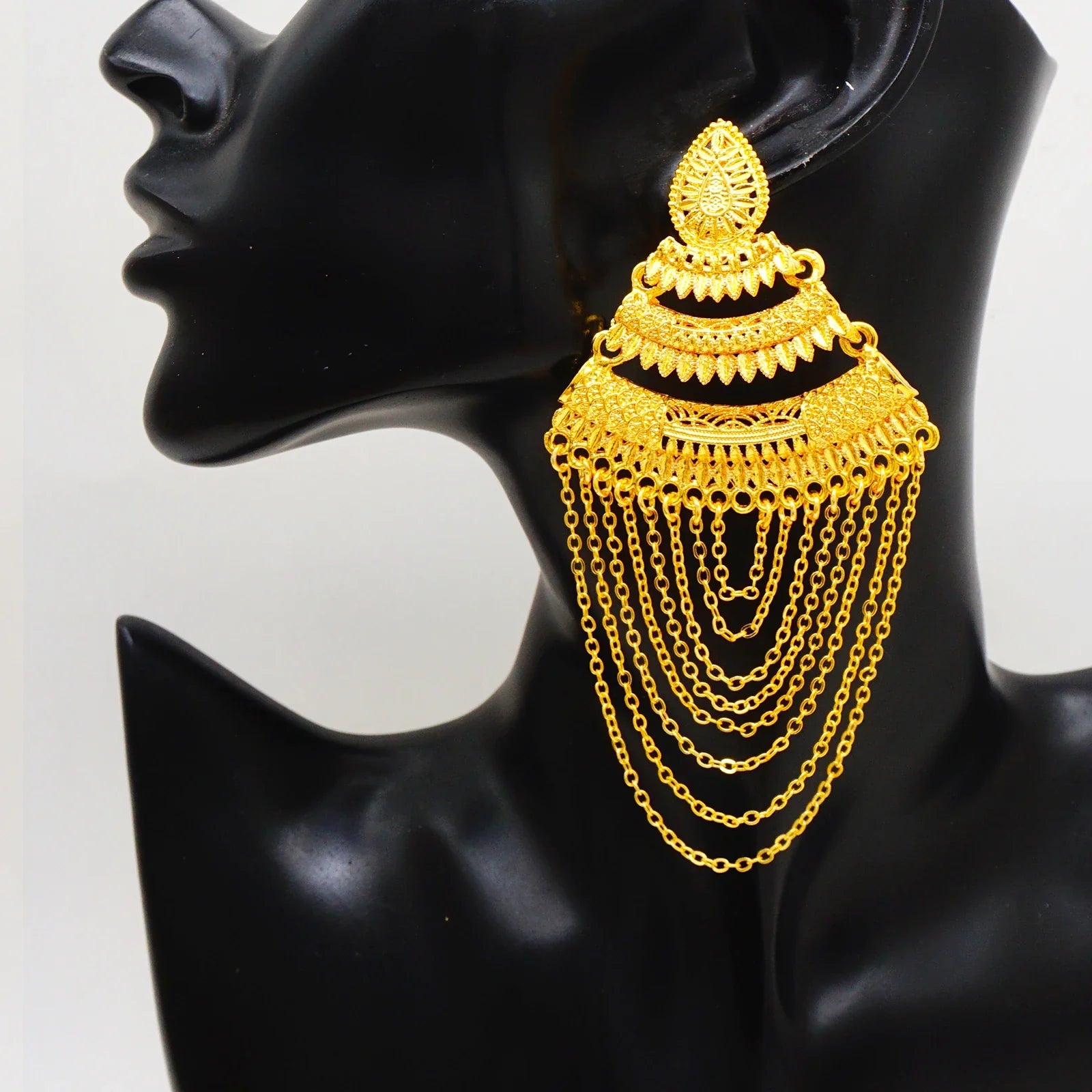 Luxury geometric long tassel earrings in elegant gold colour, crafted from copper, perfect for weddings and glamorous parties.