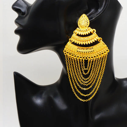 Luxury geometric long tassel earrings in elegant gold colour, crafted from copper, perfect for weddings and glamorous parties.