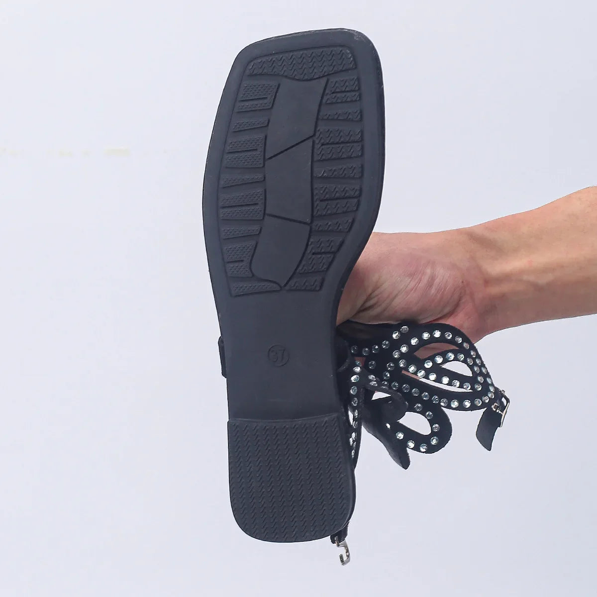 Elegant close-up of Chamliforve Gladiator Sandals showcasing premium materials and impeccable craftsmanship in blue and black shades.