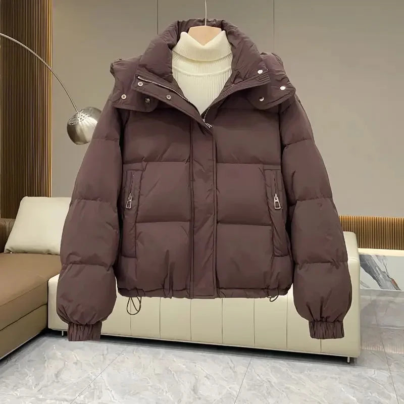 Luxurious women's hooded padded parka jacket in rich cotton and polyester blend, perfect for Autumn/Winter streetwear with an elegant design and timeless appeal.