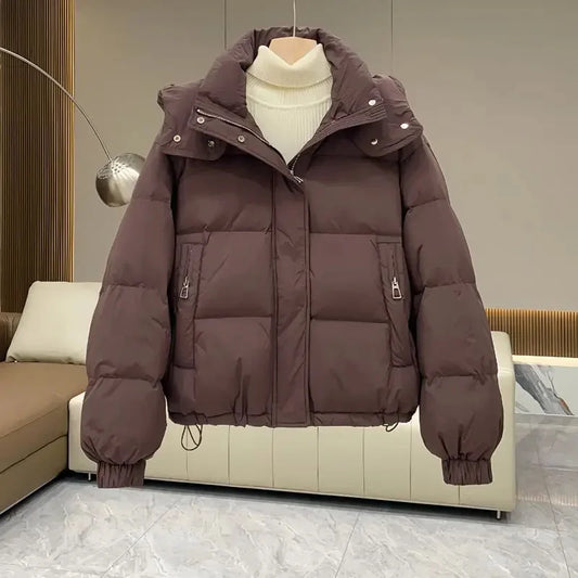 Luxurious women's hooded padded parka jacket in rich cotton and polyester blend, perfect for Autumn/Winter streetwear with an elegant design and timeless appeal.