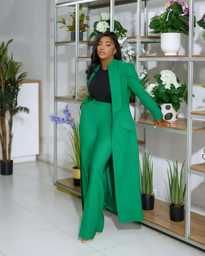 Elegant wide leg pants in high waist design, complementing the women's x-long blazer coat for a sophisticated office look.