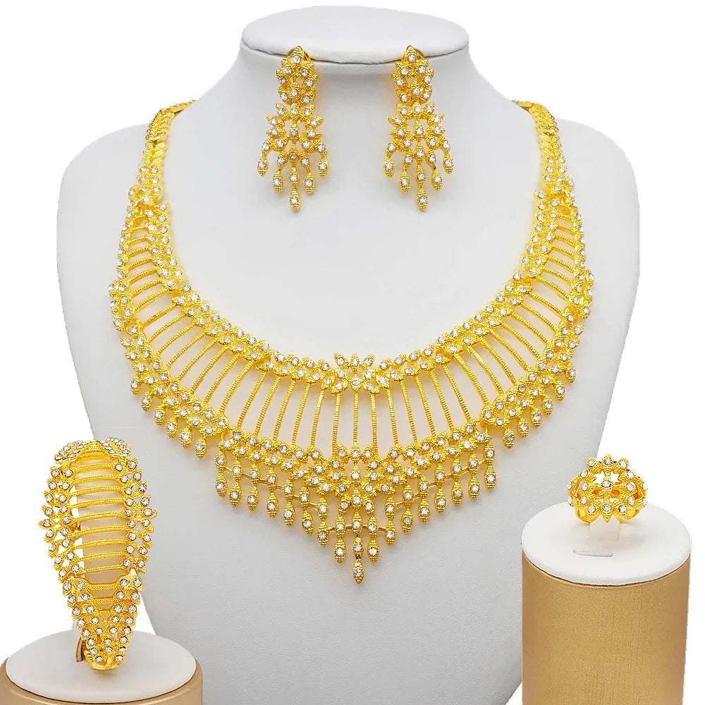 Elegant Dubai gold colour bridal jewelry set featuring a stunning necklace, earrings, bracelet and ring crafted for women, ideal for special occasions.