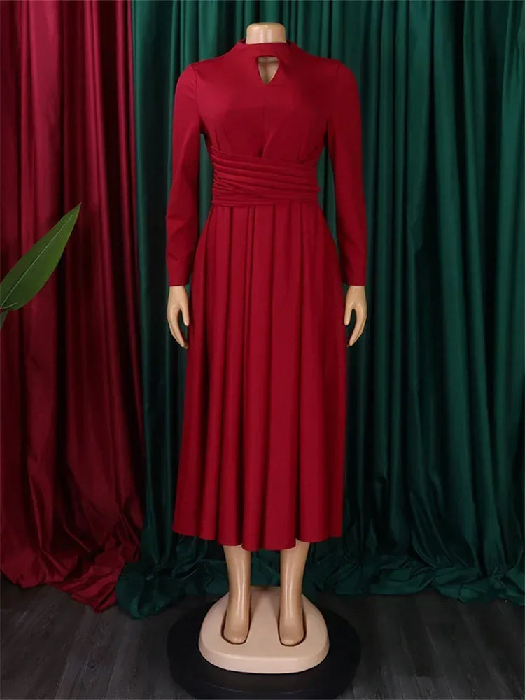 Wmstar Plus Size Women's African Dress on a model, illustrating the elegant knee-length cut and slim fit, perfect for any spring or summer event.