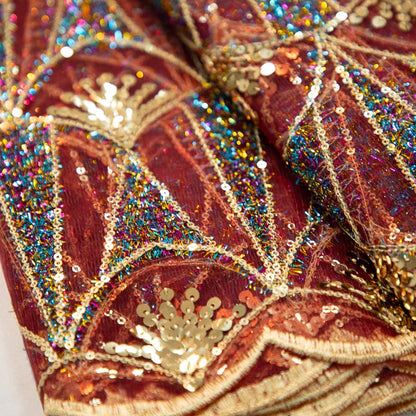 Fine detail of Kalume African lace fabric showcasing exquisite craftsmanship with sequins, best suited for high-end evening wear.