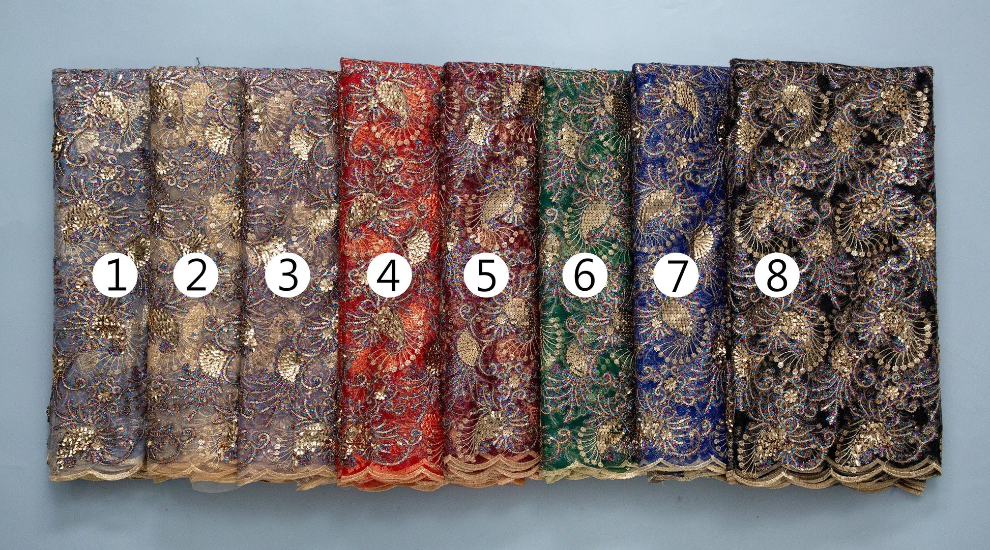 Detailed close-up of Kalume high-quality mesh lace fabric adorned with rhinestones, ideal for elegant fashion applications.