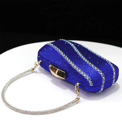 Elegant matching handbag with metal handle and long chain strap, designed to complement Venus Chan black heels.