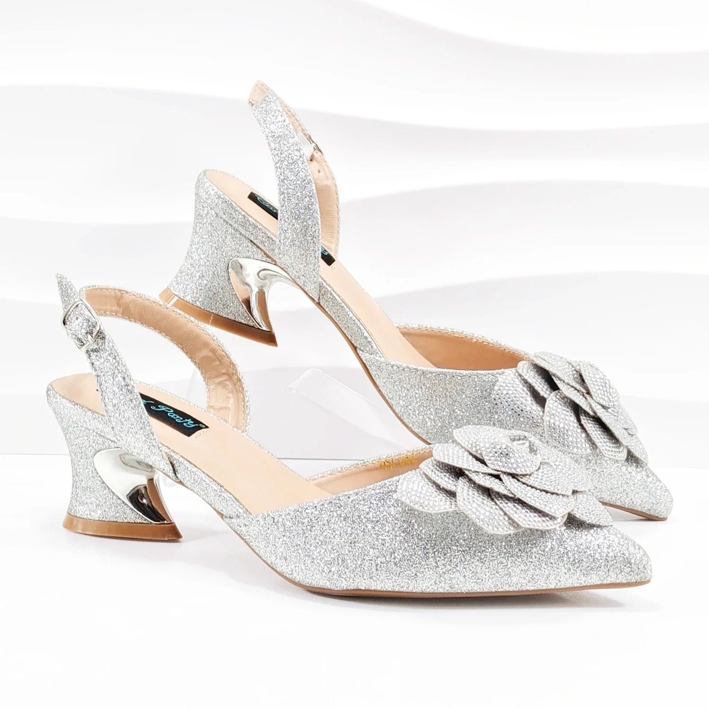 Sophisticated shot of QSGFC women's mid-heel evening pumps featuring a striking pointed toe and crystal embellishments, ideal for adding glamour to any outfit.