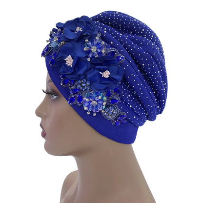 Chic African turban head wrap shown on a model, highlighting its comfort and sophisticated design, ideal for all seasons.