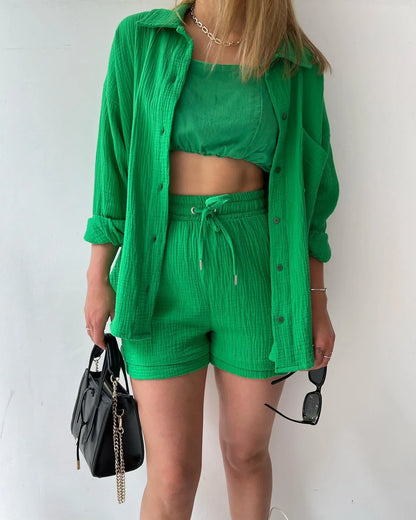 Women's luxury grass green 2-piece set featuring a loose cardigan and drawstring wide leg shorts, perfect for summer elegance.