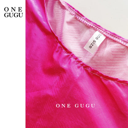 Model wearing the Luxury African Dashiki Wedding Dress in Blue Bazin Riche with tassel shawl, exuding grace and sophistication at a traditional wedding event.