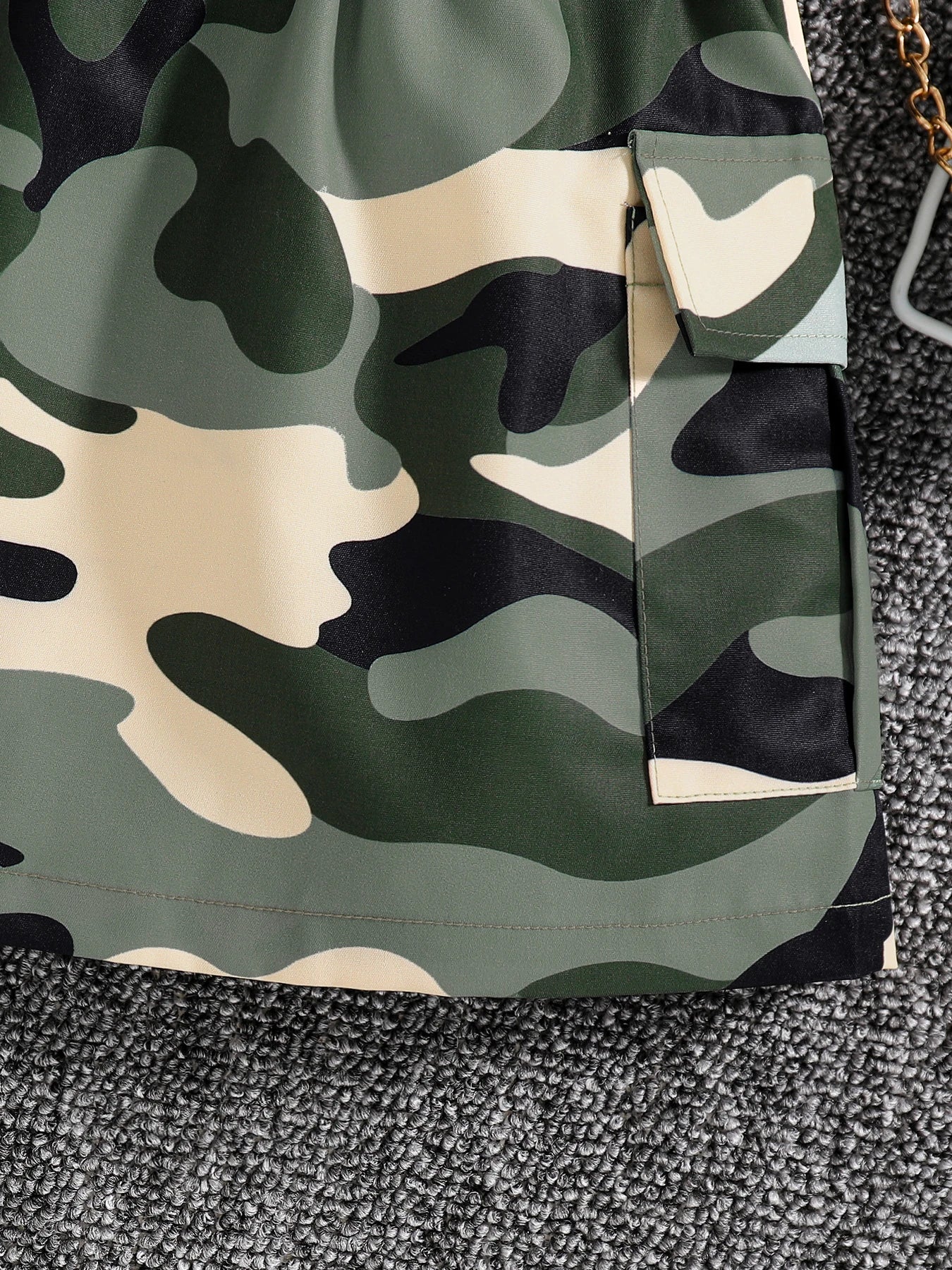 Chic camouflage skirt designed for girls, part of a stylish autumn fashion 2-piece set perfect for young trendsetters.