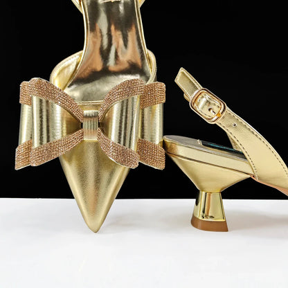 Close-up of luxurious pointed toe design on elegant women's shoes embellished with rhinestones for a sophisticated look.