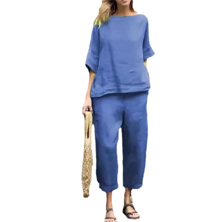 Luxury women's plus-size two-piece cotton-linen shirt and high-waisted pant suit set, showcasing elegant O-neck design and solid colour for stylish office wear.