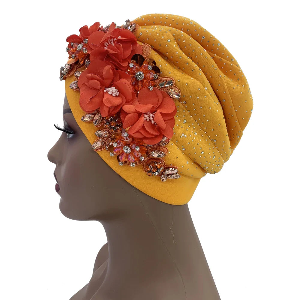 Elegant African turban cap adorned with rhinestone accents, showcased in a luxurious setting, perfect for stylish women.