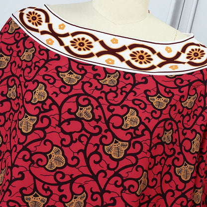 Close-up view of the luxurious O-neck detail and batwing sleeves on a Women's Bohemian Maxi Dress.