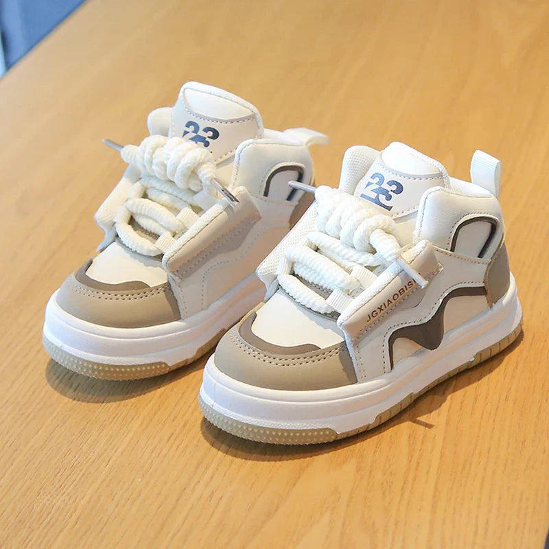 Luxurious children's high-top sport sneakers designed for ages 1-3, featuring trendy unisex styling and anti-slip rubber soles for optimum safety.