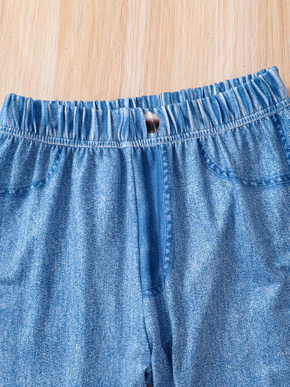 Chic micro-elastic long sleeve top adorned with playful cartoon design, suitable for young girls' wardrobes.