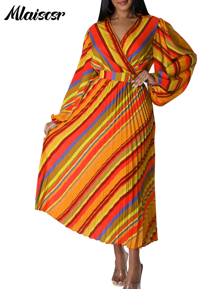 Model gracefully wearing the Mlaiscsr striped midi dress, displaying its flattering A-line silhouette and fashionable loose fit, paired with chic accessories.