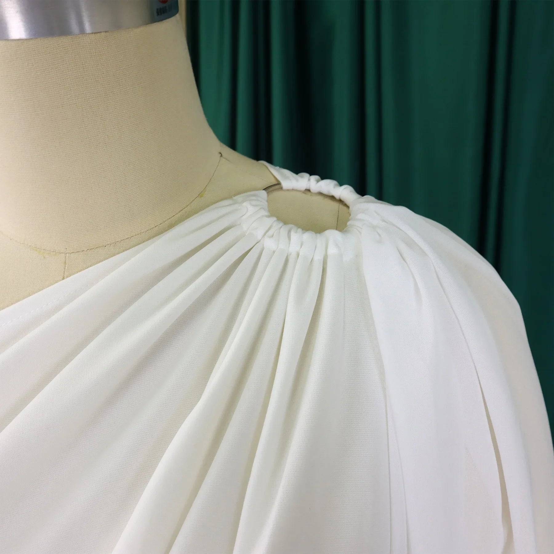 Luxury women's romper with hollow-out decoration and solid pattern, perfect for all season wear.