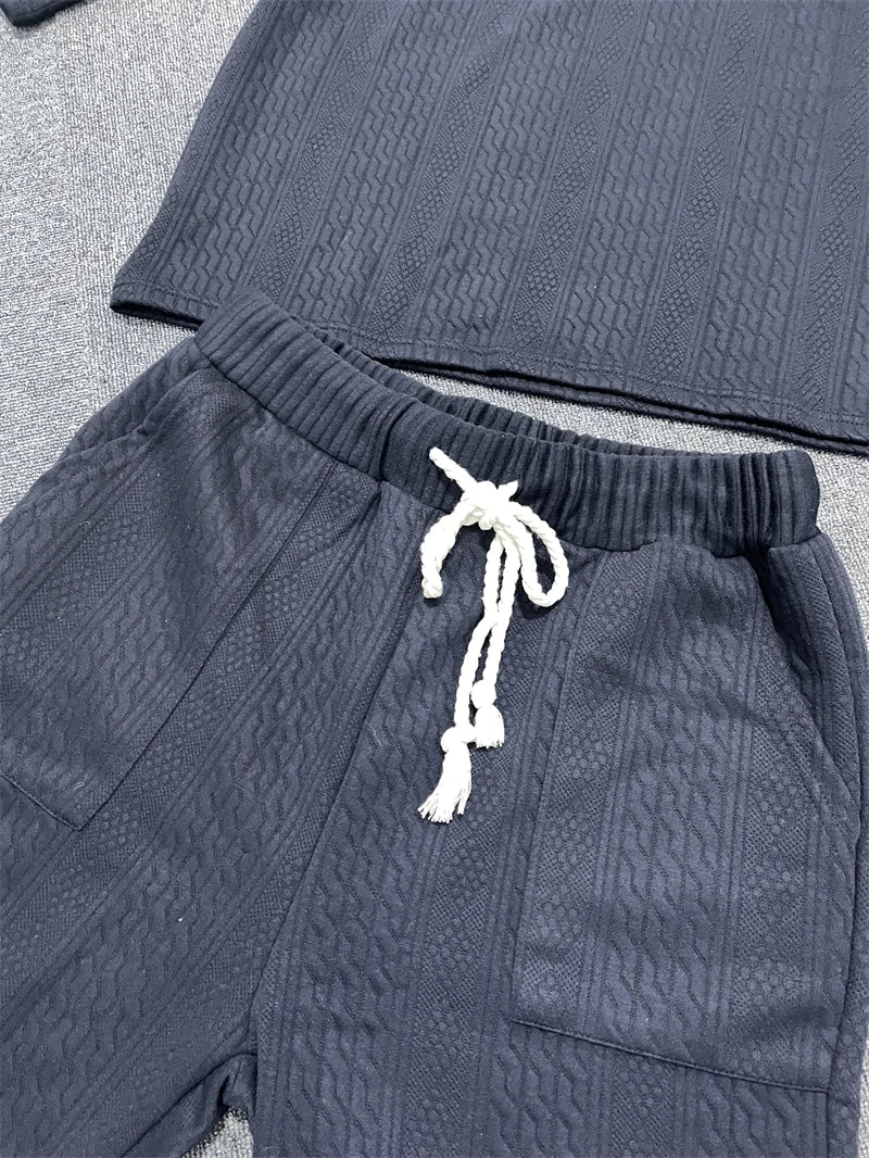 High-quality solid colour V-neck t-shirt from a men's summer outfit set, designed for comfort and style in warm weather.