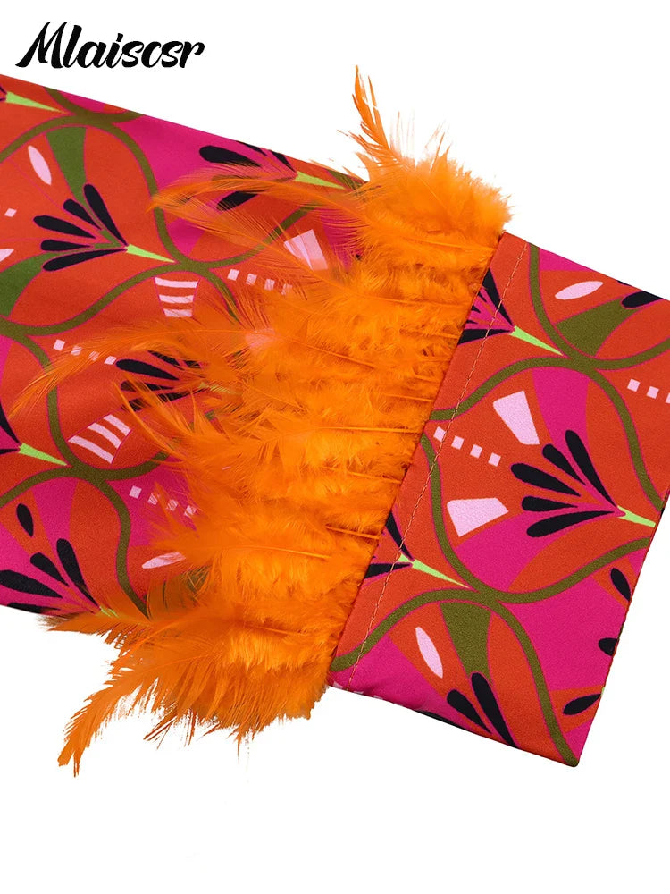 Luxury Mlaiscsr 2-piece set, combining an elegant feather print top with wide leg pants, designed for middle-aged women seeking sophistication.