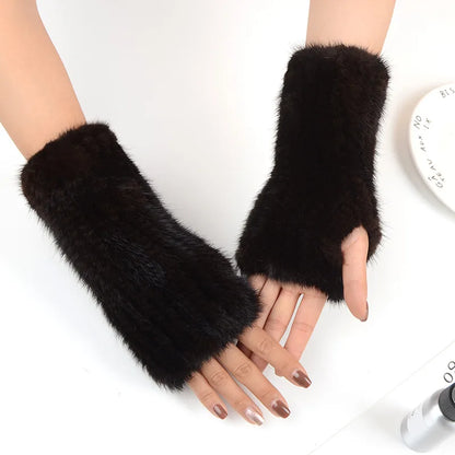 Beautifully crafted women's knitted mink fur gloves, ideal for luxurious warmth and effortless style during cold weather.
