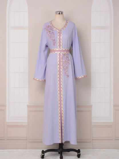 Elegant golden velvet Bat Sleeve abaya with sequins, exemplifying luxurious Muslim fashion for Ramadan.