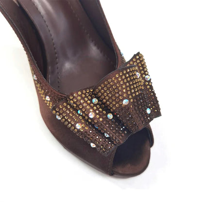 Side view of high-heeled yellow pumps with luxurious bling element, crafted for comfort and sophistication for women.