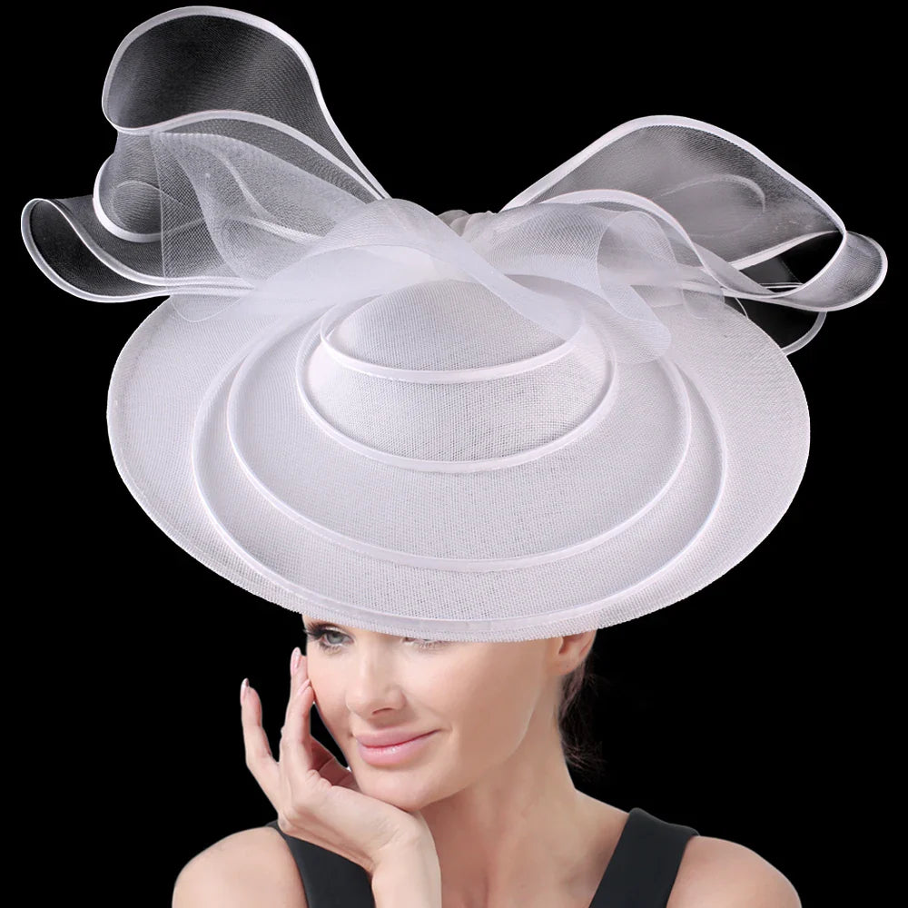 Elegant large fascinator hat for women featuring a floral design, perfect for cocktail parties, church services, and special events.