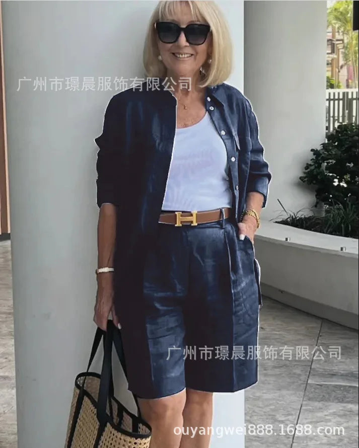 Fashion-forward cardigan and shorts ensemble for women, crafted from lightweight fabric for a refined summer appearance.