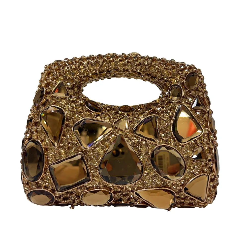 Chic interior view of the gold metallic minaudiere clutch featuring a classic hasp closure, ideal for a sophisticated evening look.