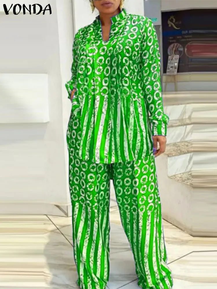 Contemporary plus size VONDA women's casual set in 5XL, featuring a long sleeve shirt with an eye-catching mix of polka dots and stripes, paired elegantly with flexible elastic pants.