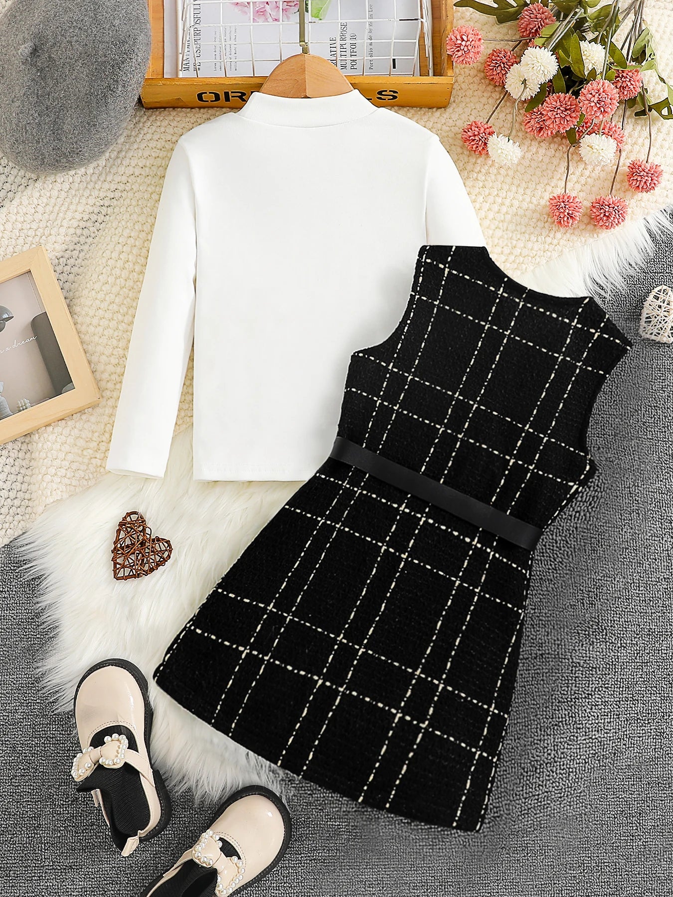 Elegant two-piece outfit for girls aged 4-6, showcasing a chic crew neck seamless top with a captivating plaid knee-length skirt, ideal for celebrations.
