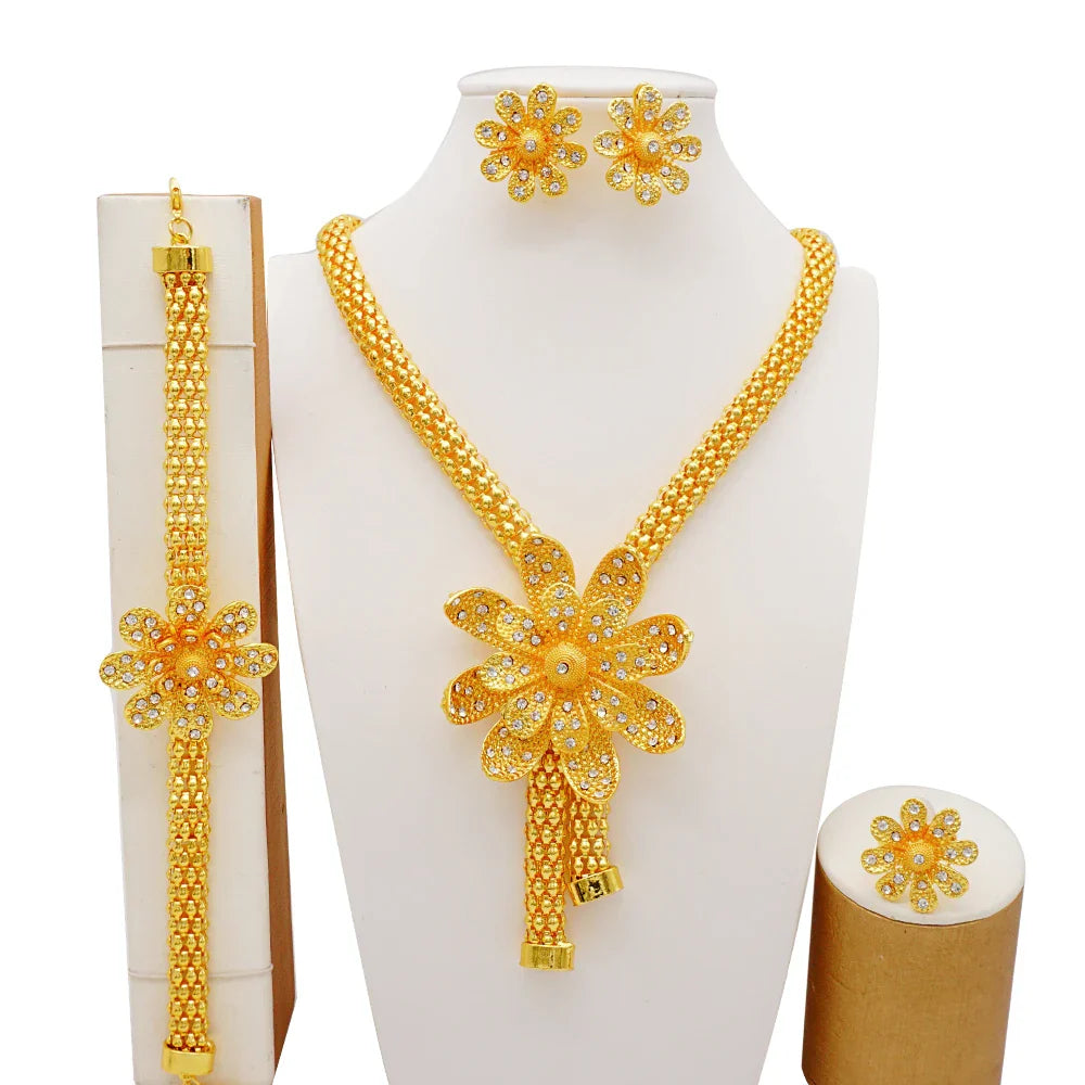 Beautiful arrangement of the gold colour earrings from the women’s bridal jewelry set, highlighting their elegant African-inspired design, perfect for special occasions.