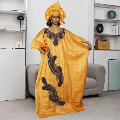 Close-up of the exquisite embroidery on a Traditional African Dashiki Gown, featuring elegant patterns and fine craftsmanship in rich green Ankara material.