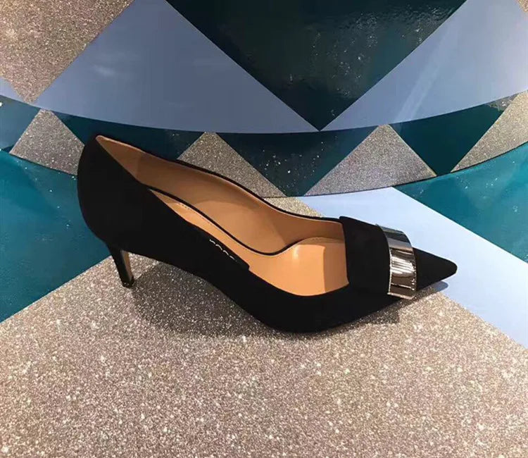 Sophisticated close-up view of luxury women's glossy sequined cloth high heels with slim stiletto and slip-on style, ideal for the modern office lady.