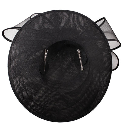 Elegant large fascinator hat for women, adorned with floral accents, perfect for cocktail and church events.