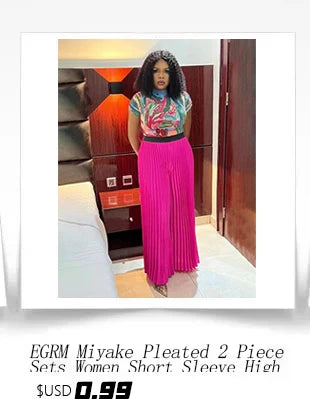 Chic ankle-length pleated skirt, showcasing vibrant prints, designed for plus-size elegance and versatility by EGRM.