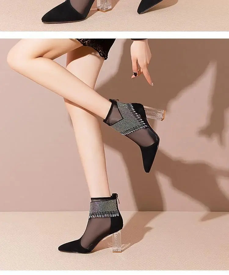 Luxurious design of women’s pointed toe high heel dance boots showcasing rhinestones and tassels, complemented by a durable rubber sole and sophisticated lace-up mesh.