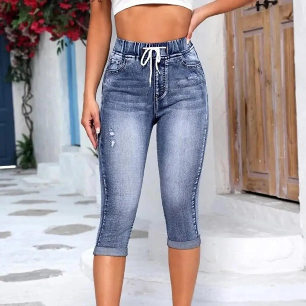 Elegant high waist women's leggings with vintage denim design, featuring pockets and an elastic drawstring for a luxurious fit.