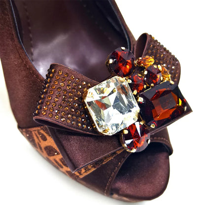 Luxury royal blue rhinestone handbag elegantly displayed with glimmering embellishments, perfect for brides and party occasions.