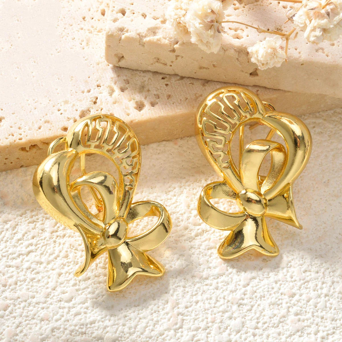 Glamorous pair of copper ear studs, elegantly designed for bridal parties, ideal as a gift for women celebrating special occasions.