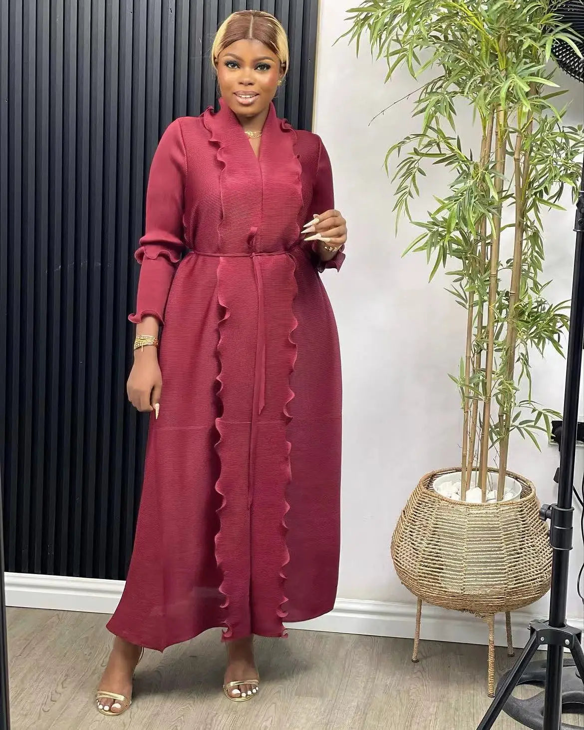 Model wearing a beautifully designed ankle-length loose casual abaya dress, perfect for spring and summer seasons, embodying luxury and elegance for festive occasions.