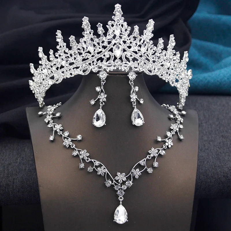 Elegant opal green bridal tiara featuring intricate crystal designs, perfect for weddings and special occasions.