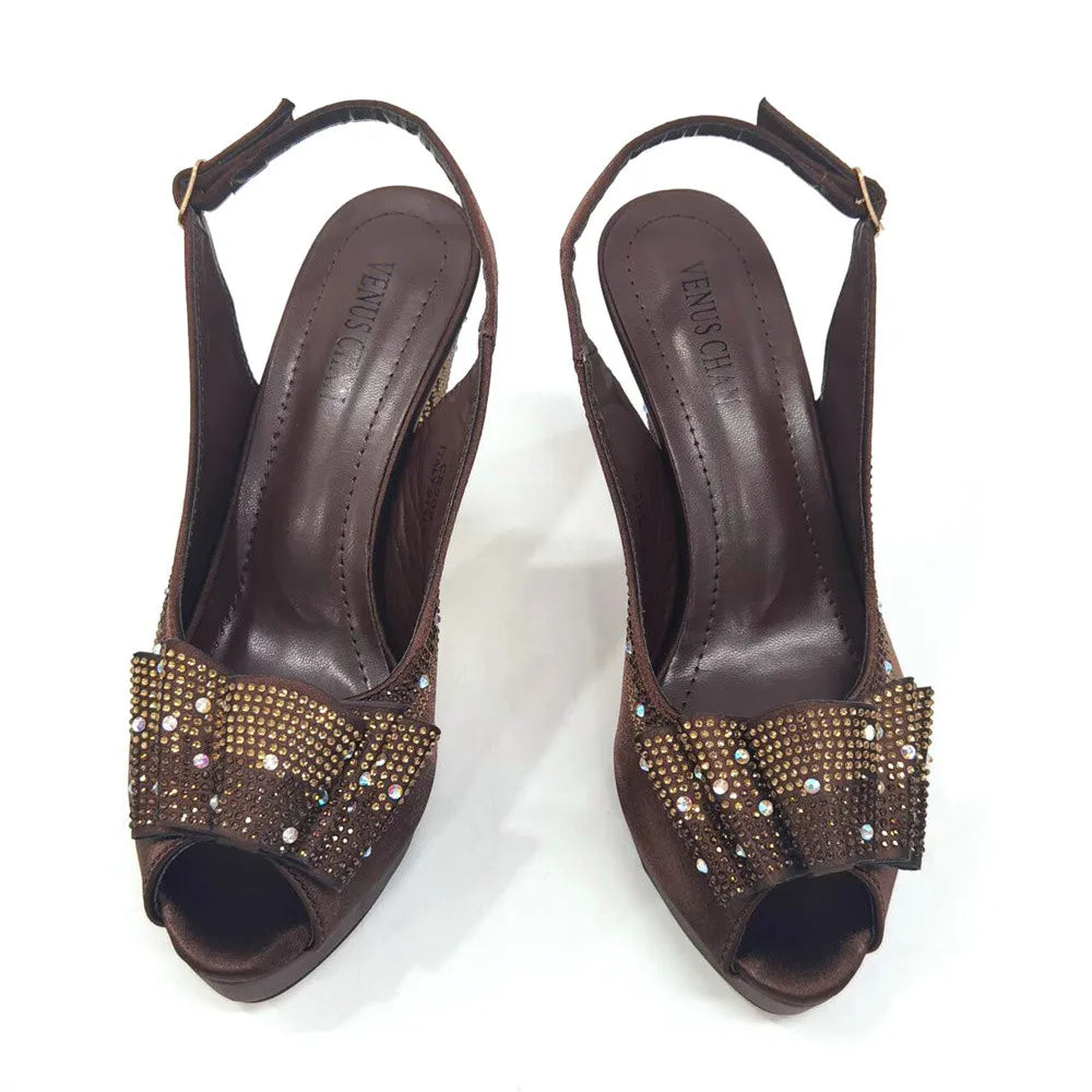 Profile view of coffee-tone slingback sandals designed for women, showcasing exquisite craftsmanship and comfort for special occasions.