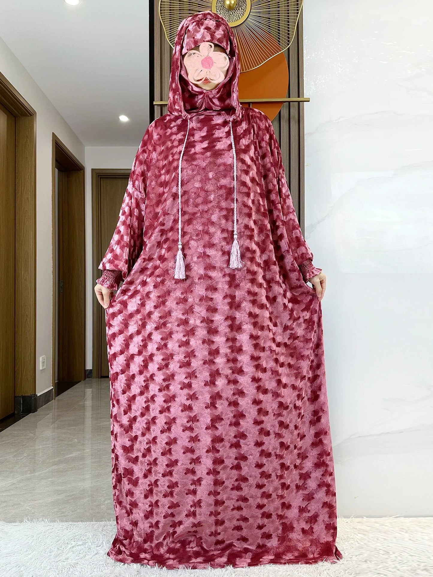 Model wearing a stylish Islamic Kaftan Dress, featuring high stretch velvet for a comfortable yet elegant fit.