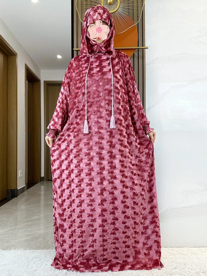Model wearing a stylish Islamic Kaftan Dress, featuring high stretch velvet for a comfortable yet elegant fit.
