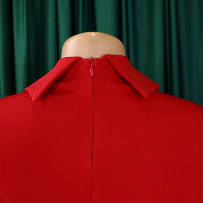 Close-up of the luxurious fabric texture of the women's evening dress, showcasing intricate pleats and elegant detailing.